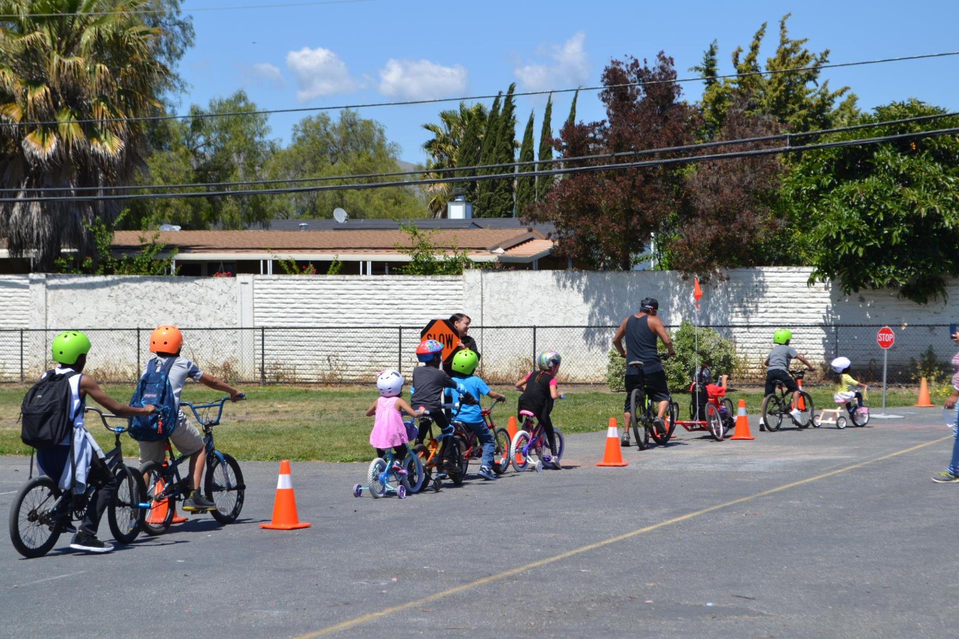 Children riding their bicycles during a bicycle safety class