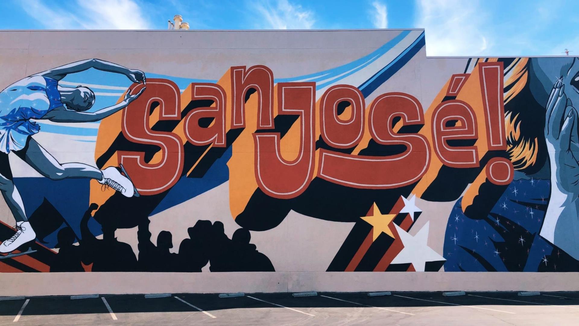 Image of an outdoor wall with a mural of the words San Jose