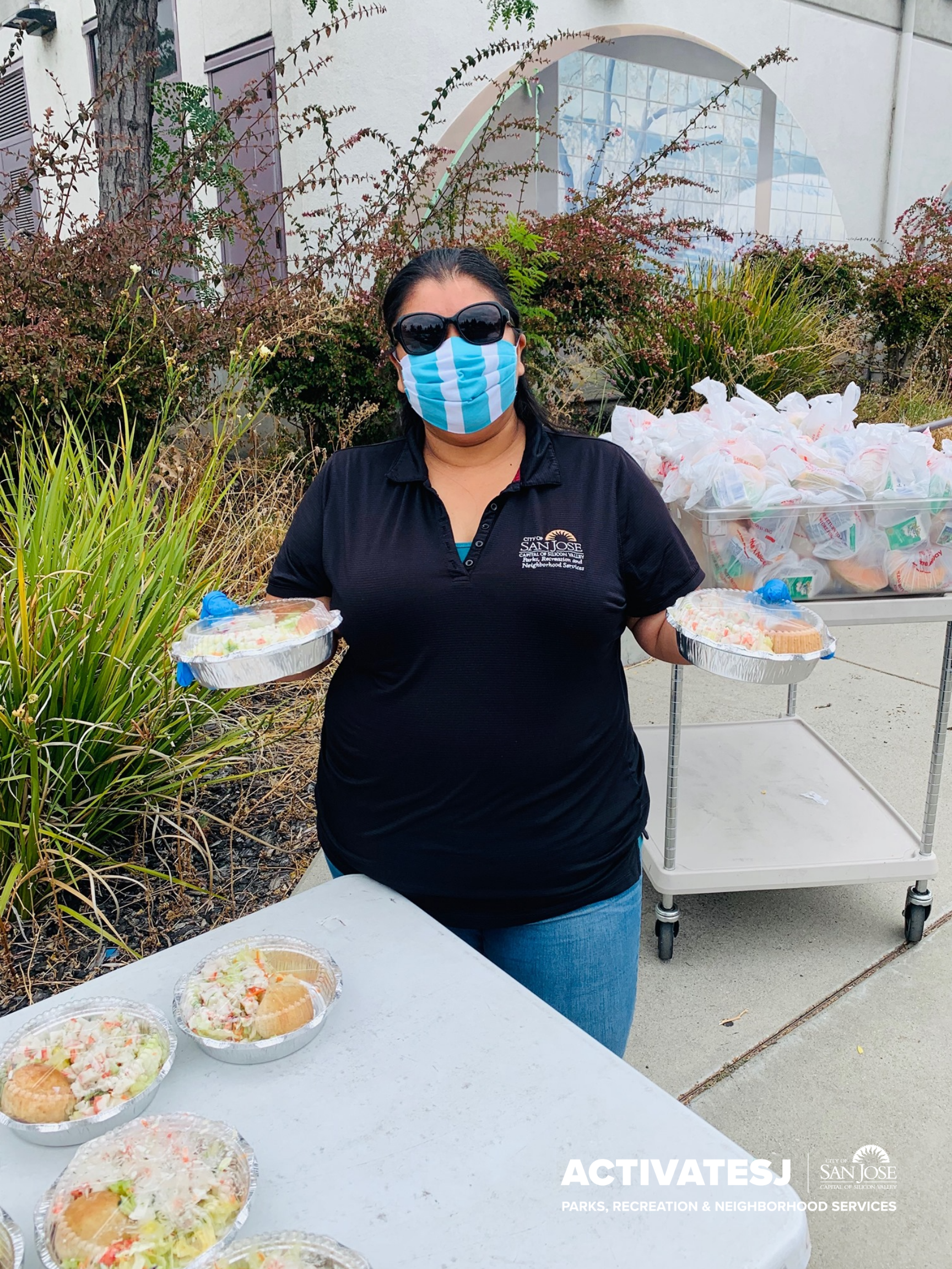 Senior Nutrition Program staff distributing food