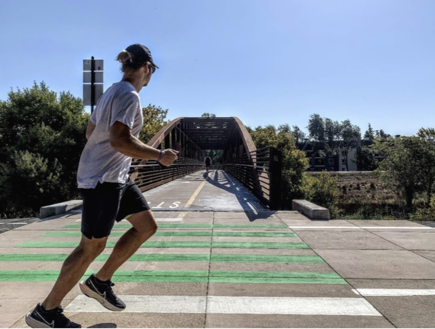 Trail user jogging at a SJ Trail