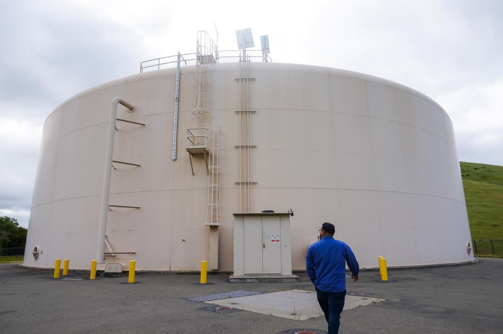 San José Municipal Water System Reservoir with Water System Operator, Jesus Castro