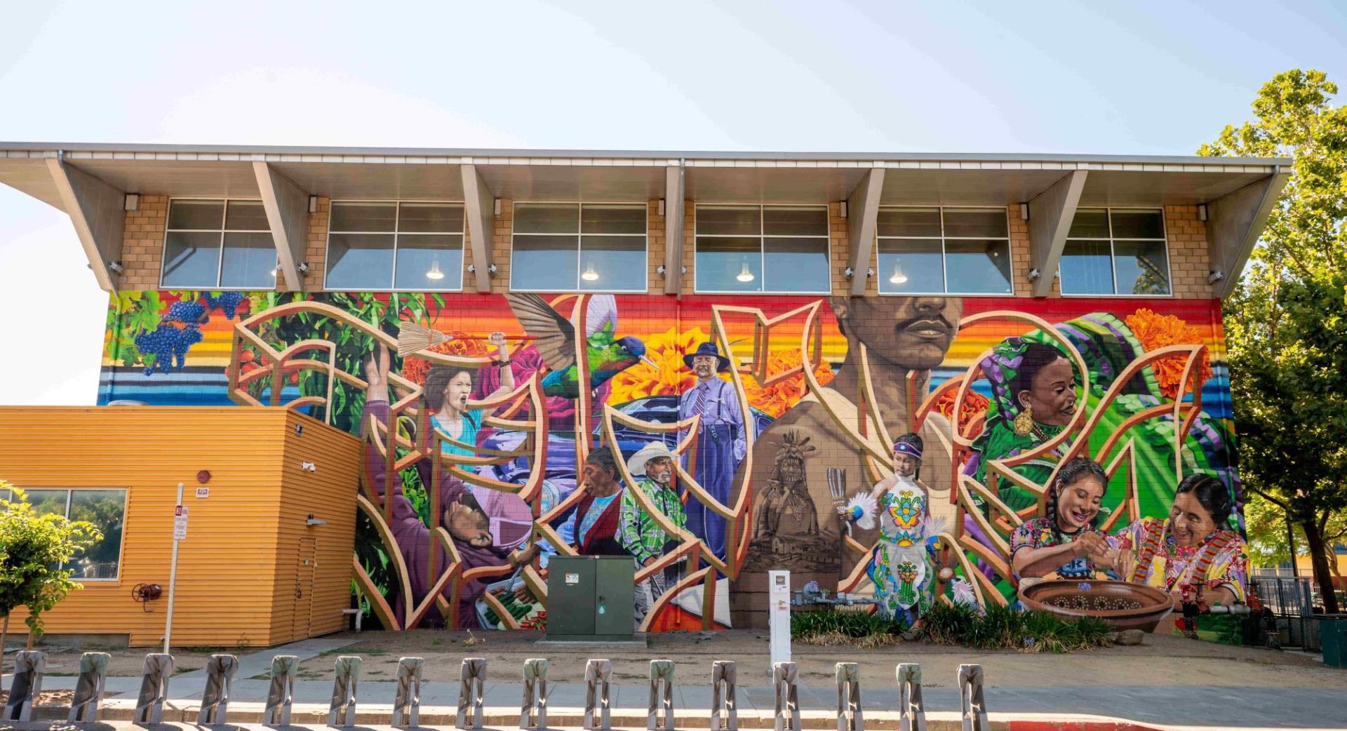 wide shot of exterior multicolor public art mural project