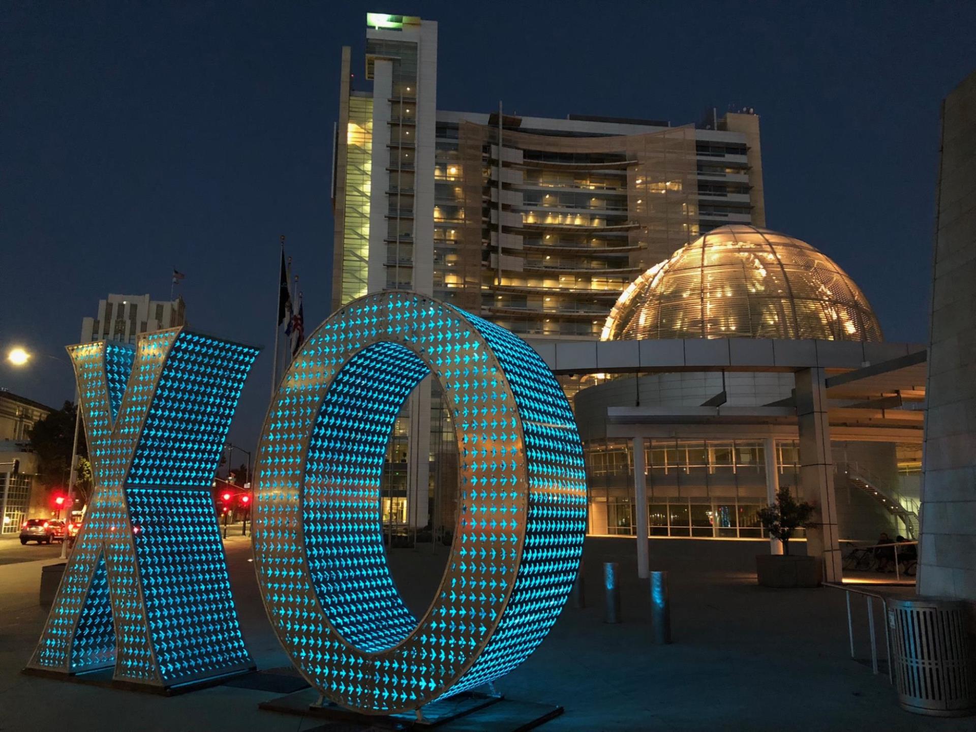 Sculpture of an X and an O installed at San Jose City Hall